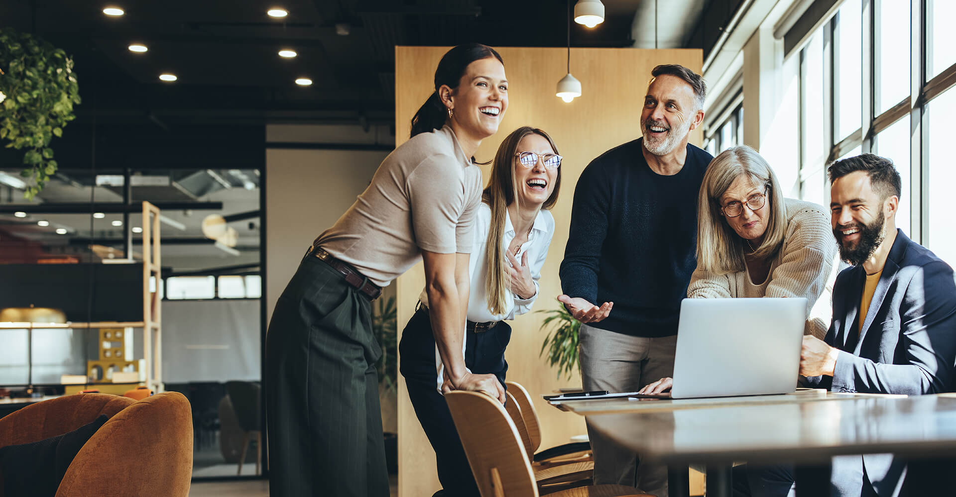 Group Of People Laughing At The Office